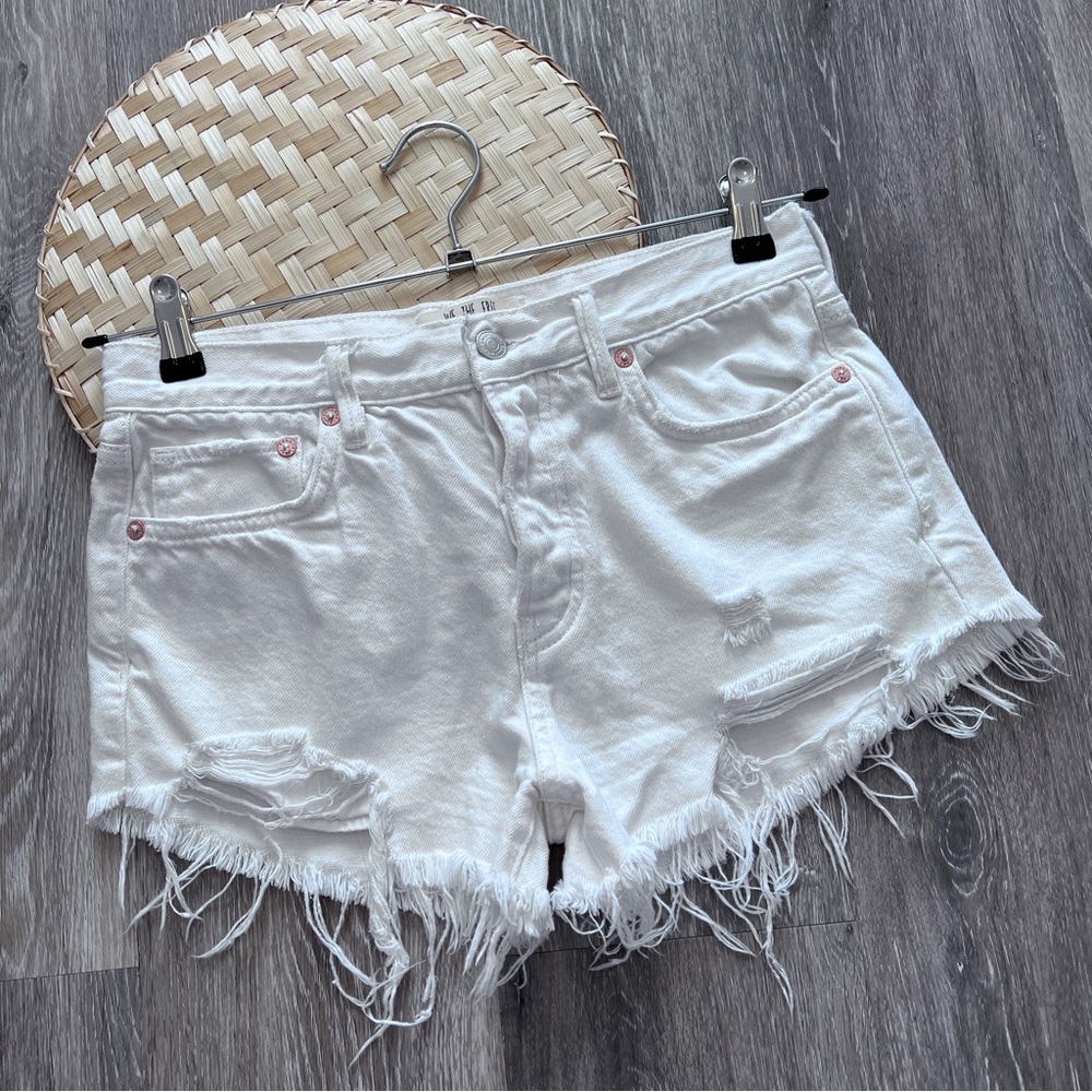 Free people white distressed denim shorts button fly